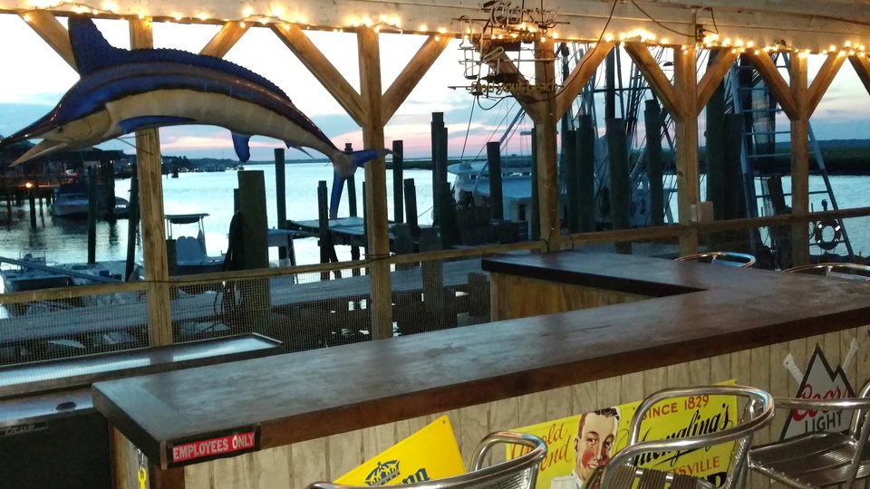 Casual bar with dockside views
