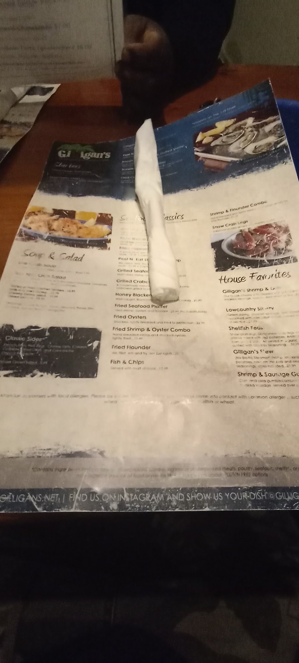 Cocktails beside fried shrimp dishes